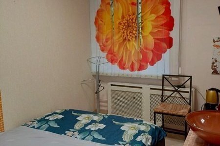 Кровать в номере Эконом в мини-отеле Аура