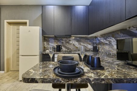 Обеденная зона в номере Emerald Suite в ЖК Савеловский Сити