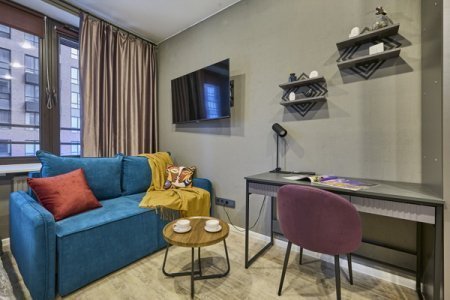 Зона отдыха в номере Emerald Suite в ЖК Савеловский Сити