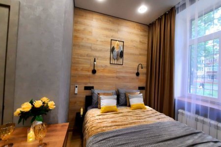Большая кровать в номере Нептун в LOFT SPACE