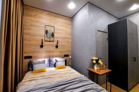 Большая кровать в номере Сатурн в LOFT SPACE