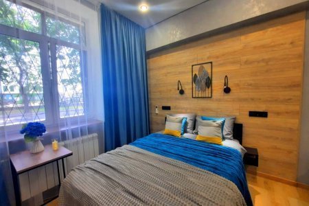 Двуспальная кровать в номере Сириус в LOFT SPACE