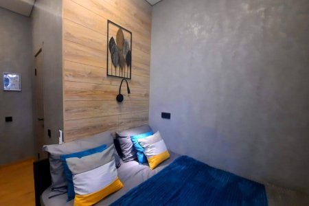 Двуспальная кровать в номере Венера в LOFT SPACE