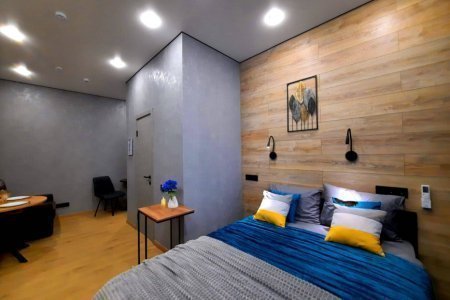 Кровать в номере Юпитер в LOFT SPACE