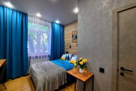 Кровать в номере Марс в LOFT SPACE