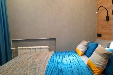 Кровать в номере Меркурий в LOFT SPACE