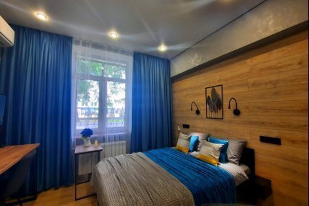 Кровать в номере Сириус в LOFT SPACE