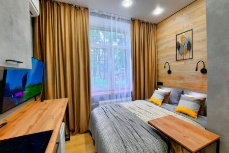 Кровать в номере Солнце в LOFT SPACE