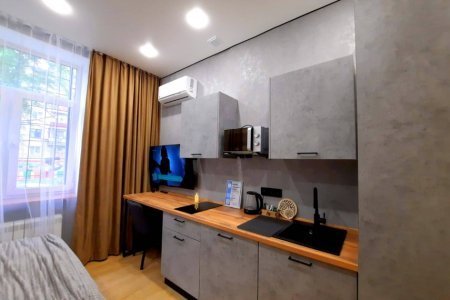 Кухня в номере Уран в LOFT SPACE
