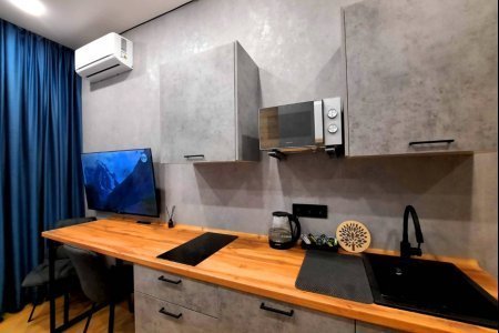 Кухонная зона в номере Юпитер в LOFT SPACE