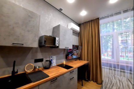 Кухонная зона в номере Сатурн в LOFT SPACE