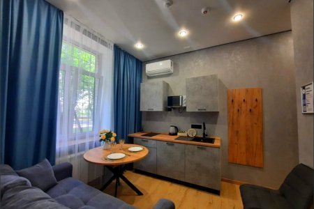 Обеденная зона в номере Меркурий в LOFT SPACE