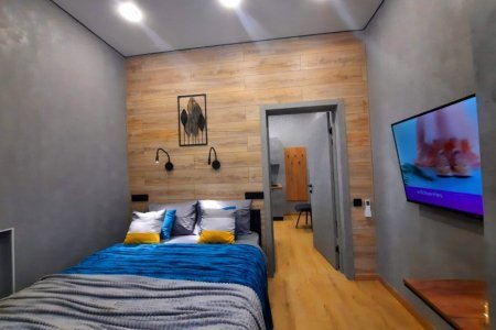 Спальная зона в номере Меркурий в LOFT SPACE