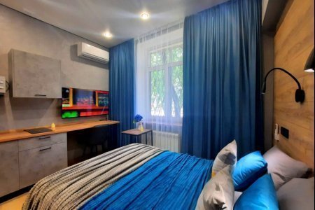 Спальная зона в номере Сириус в LOFT SPACE