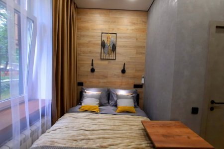 Спальная зона в номере Солнце в LOFT SPACE