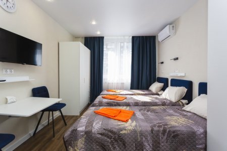Две кровати в квартире 9 в апартаментах Home Like
