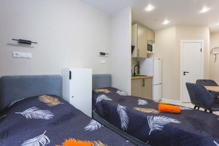 Две кровати в студии №23 в апартаментах Home Like