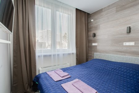 Кровать в квартире 11 в Home Like