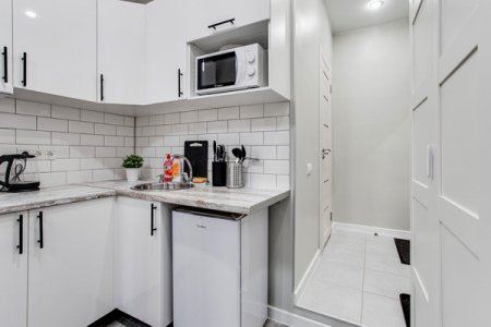 Кухонный уголок в номере 2 в апартаментах Home Like