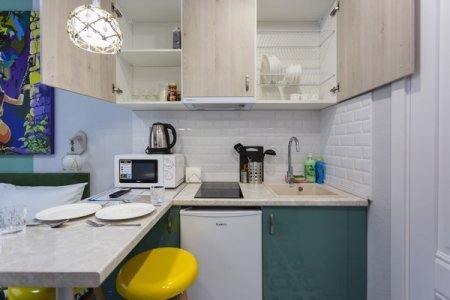Кухонный уголок в студии 25 в апартаментах Home Like