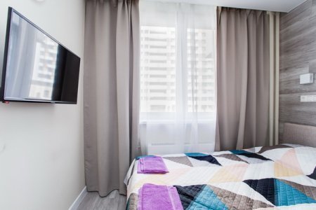 Спальная зона в квартире 7 в апартаментах Home Like