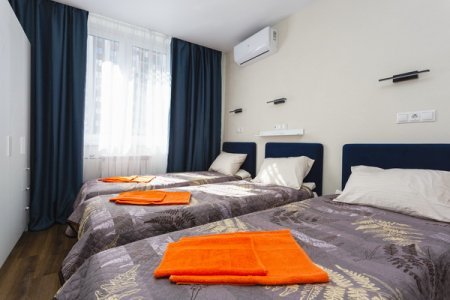 Спальная зона в квартире 9 в апартаментах Home Like