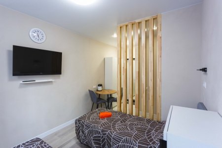 Спальная зона в студии №22 в апартаментах Home Like