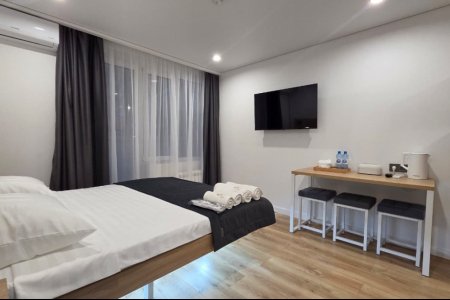 Интерьер в номере Комфорт трехместный №1 в отеле Buta Hotel 4