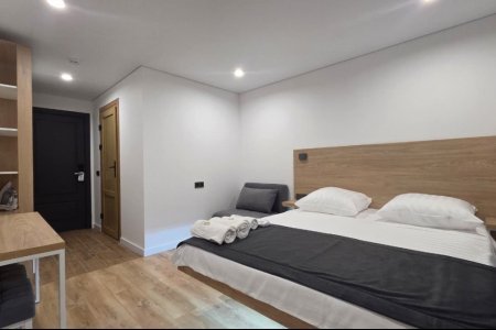 Комфорт трехместный №1 в отеле Buta Hotel 4