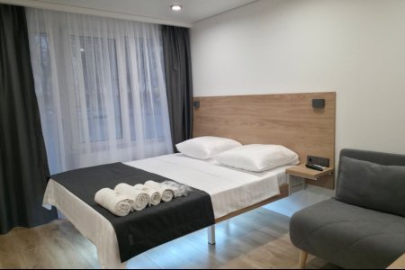 Комфорт трехместный №5 в отеле Buta Hotel 4
