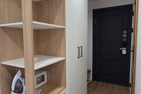 Шкаф в номере Комфорт №2 в отеле Buta Hotel 4