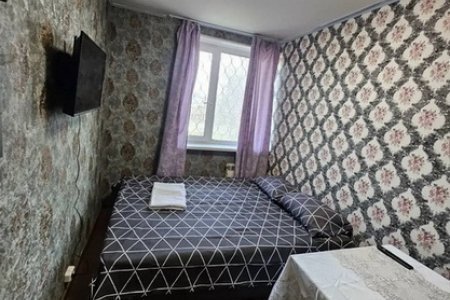 Большая кровать в номере в отеле LemonLime Hotel