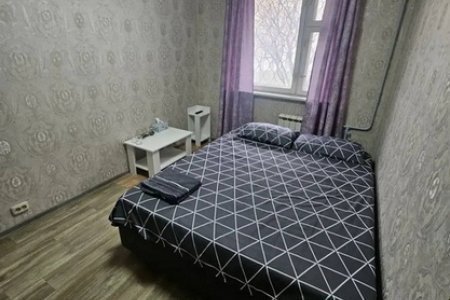 Кровать в номере в отеле LemonLime Hotel