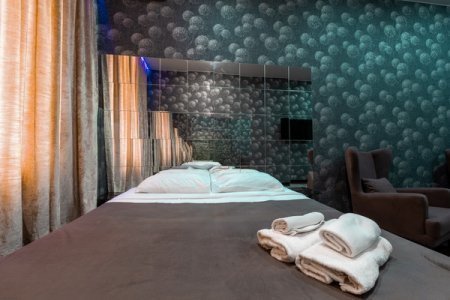 Кровать в номере 6 Делюкс в отеле De Art на Тверской