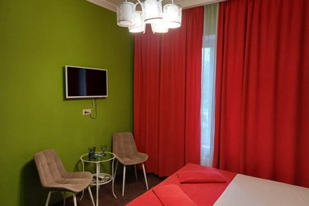 Снять Люкс — от 1300 ₽/ч Интерьер номера Люкс Запретный плод в отеле Элитон Жулебино
