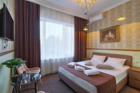 Забронировать Полулюкс — от 1200 ₽/ч Номер Полулюкс Артемида в отеле Элитон Жулебино
