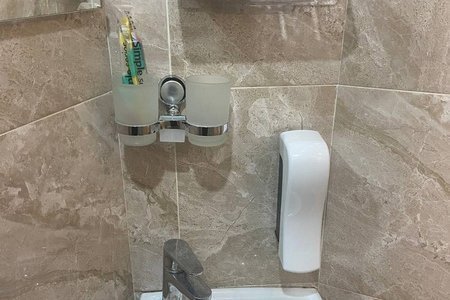 Эконом Подиум — цены от 900 ₽ Раковина в номере Эконом Подиум в отеле Элитон Жулебино