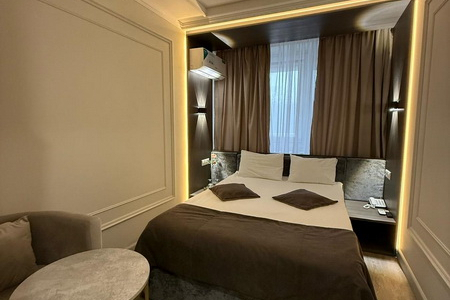 Кровать в номере комфорт + в отеле Инвайт Коломенская