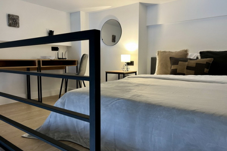Кровать в номере Делюкс в Prive Luna