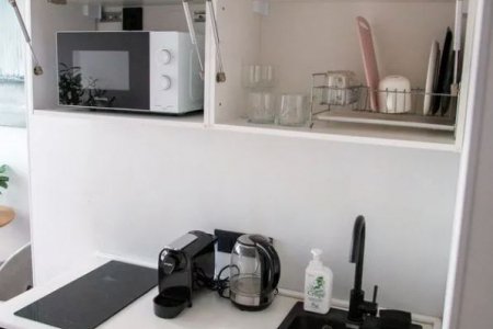 Кухонный уголок в номере 17,2 м² в апартаментах Москва-Сити