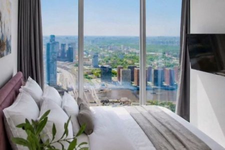 Спальная зона в студии 30 м² в апартаментах Москва-Сити