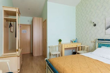 Спальная зона в номере Винтаж в отеле Пушка